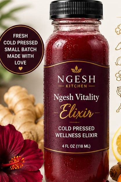 Ngesh Vitality Elixir bottle with fresh ginger, turmeric, lemon, and hibiscus